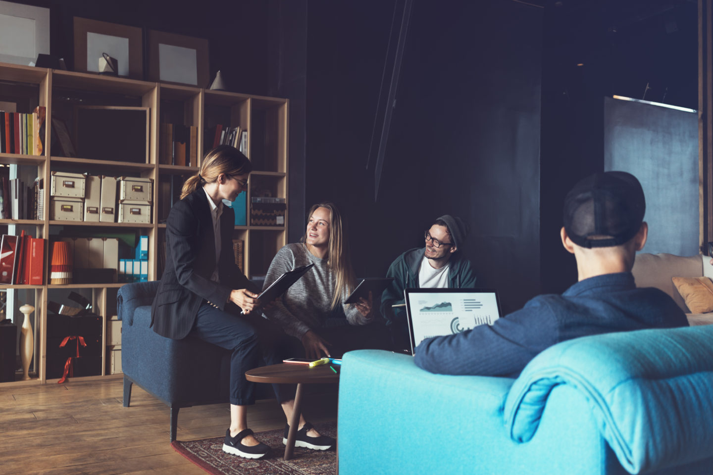 Business team meeting on the couch in office